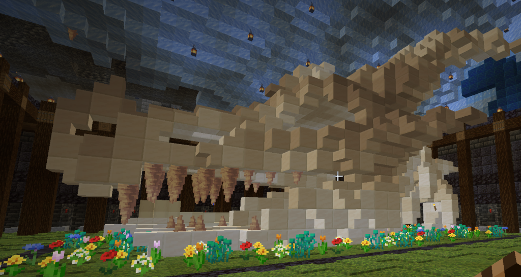 Elder Scrolls Minecraft build of The Dragon’s Lair — a frozen cavern with a massive dragon skeleton, inspired by Skyrim.